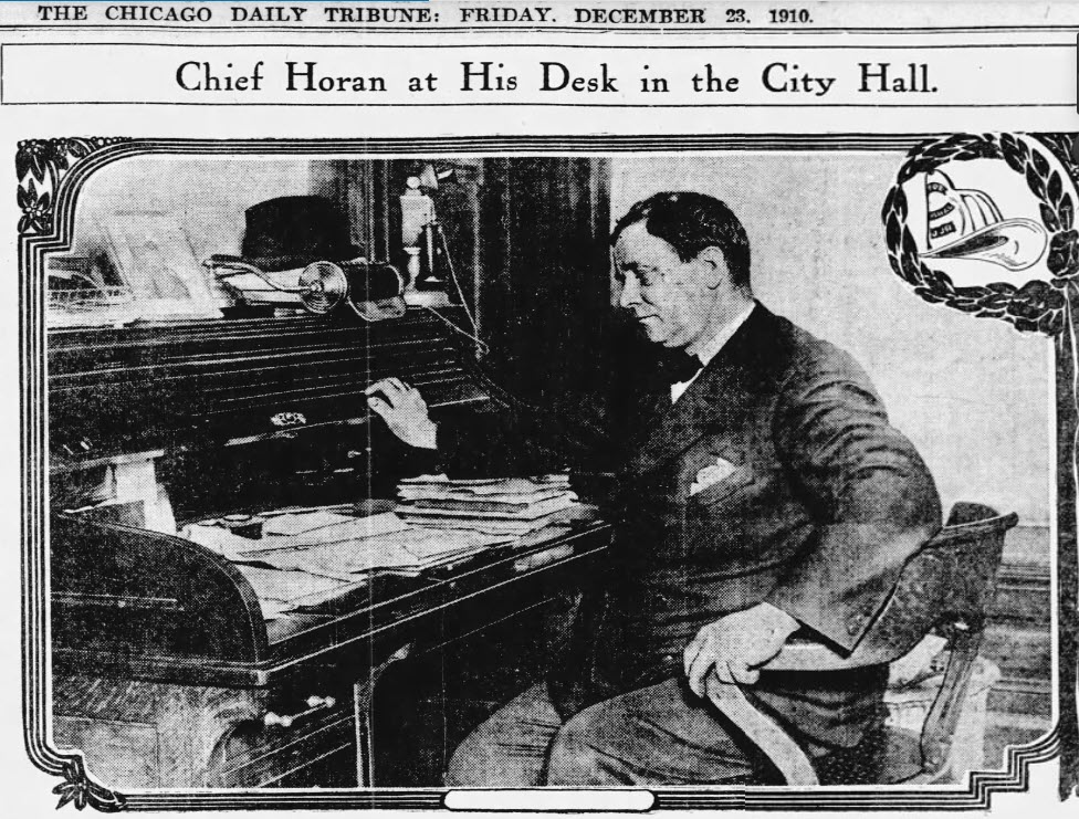 Chief James J. Horan seated at his desk in City Hall, published the day after his death.